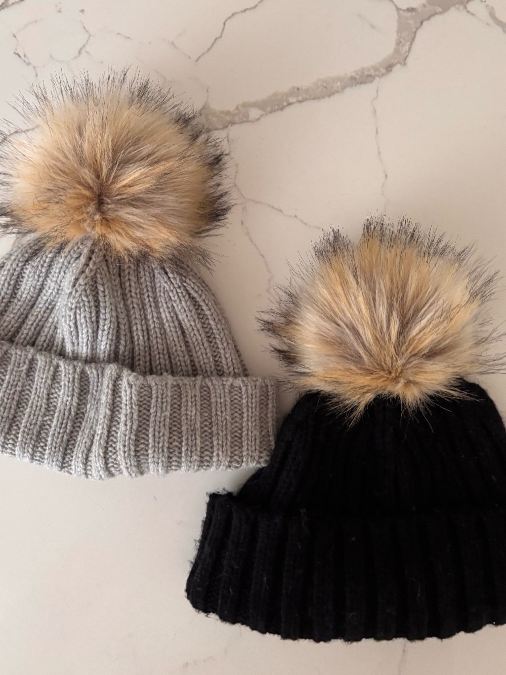 JCrew Super soft faux fur pom pom knit hats. One size, blk and h. grey
